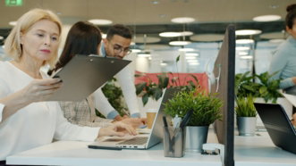 colleagues-collaborating-in-a-modern-office-environment.jpg Colleagues collaborating in a modern office environment