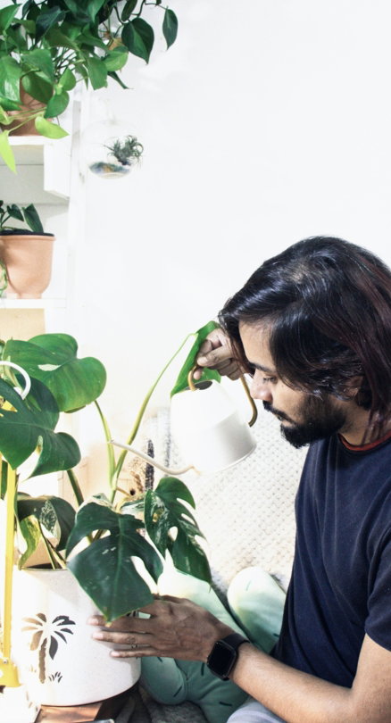 man-in-blue-crew-neck-t-shirt-sitting-beside-green-plant.jpg man in blue crew neck t-shirt sitting beside green plant